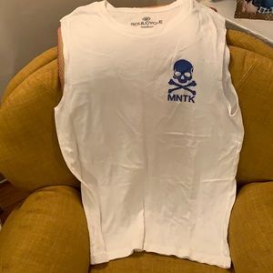 SoulCycle sleeveless muscle tee with MNTK (Montauk) logo on front